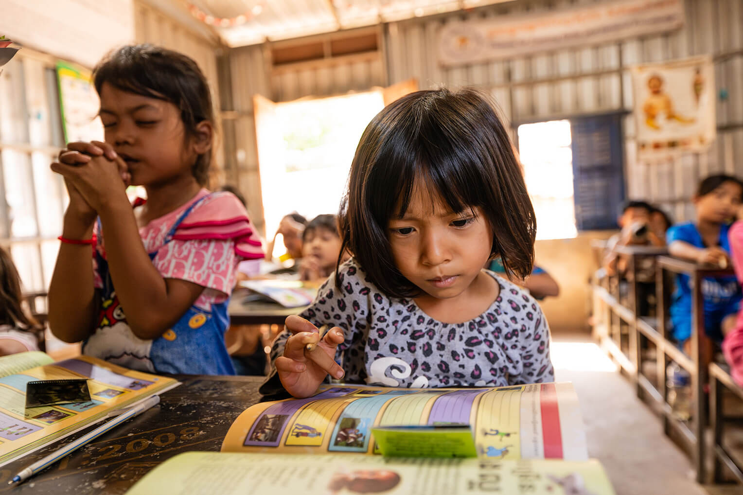 child studying the greatest journey